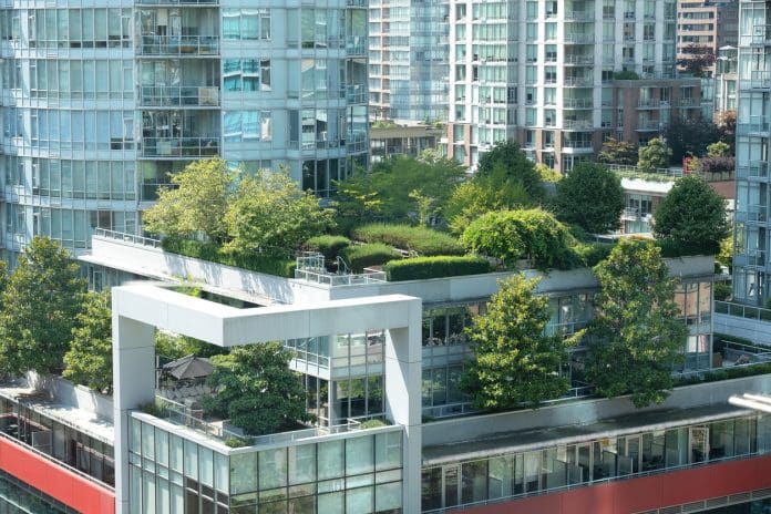 Modern Green City - rooftop and patio gardens amidst modern office and residential towers in downtown city center. Vancouver, British Columbia, Canada.