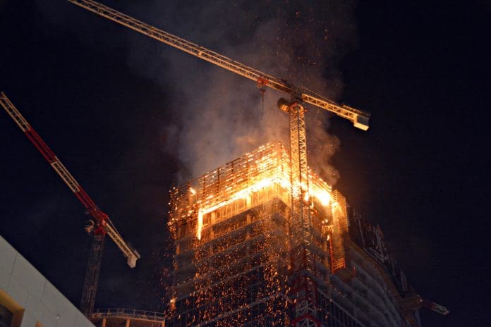 Fire in a high-rise building construction site