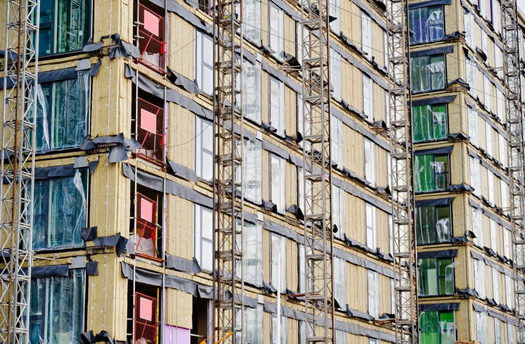 High rise residential building of flats with cladding being replaced with fire resistant materials UK, reperesenting buildings covered under the new remediation acceleration plan