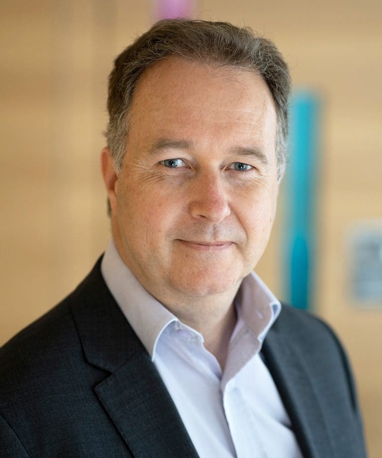 A headshot of Mark Macaulay