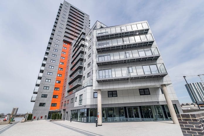 The Mast Quays tower block, including the orange cladding that will need replacing