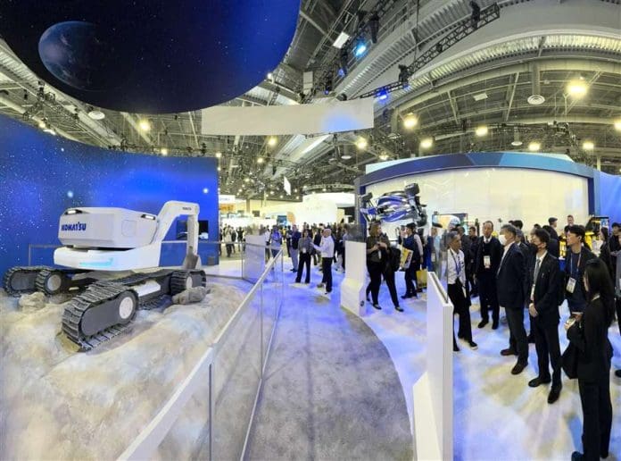 Attendees at CES 2025 in Las Vegas view Komatsu’s concept for lunar construction equipment in the global manufacturing giant’s booth in West Hall. (Photo: Business Wire)