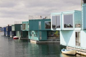 Urban Rigger mobile communities is student apartments built with upcycled shipping containers on the water by world renowned danish architect Bjarke Ingels. Copenhagen, Denmark - July 22, 2021.