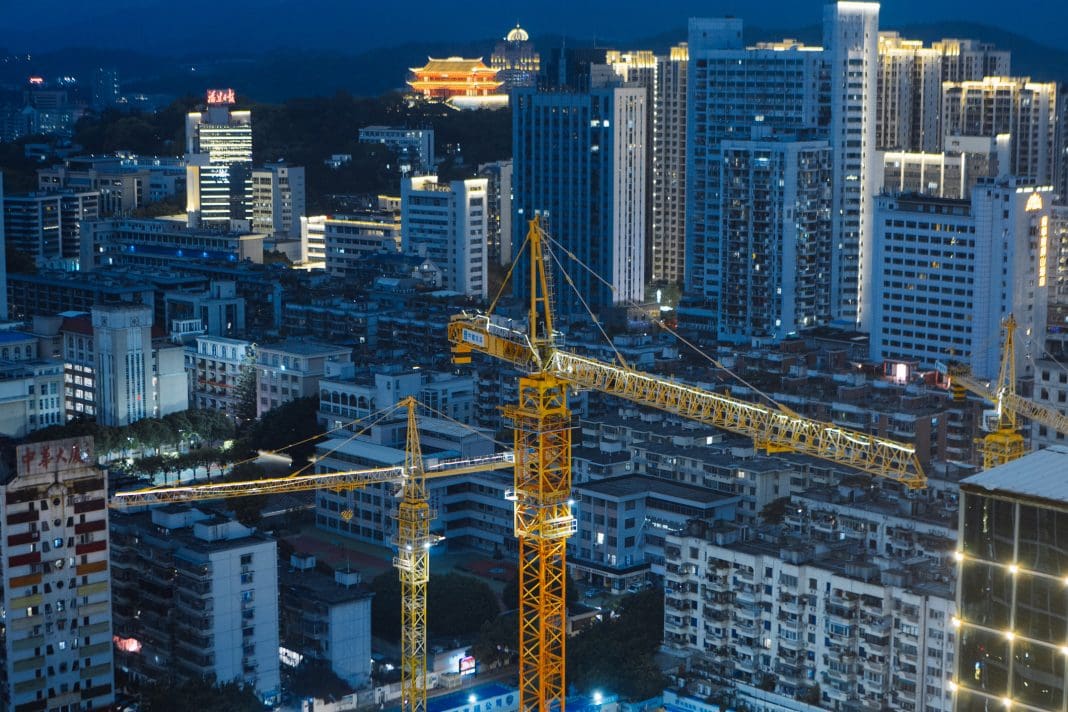 Tower crane, construction site, city center, representing China's construction industry