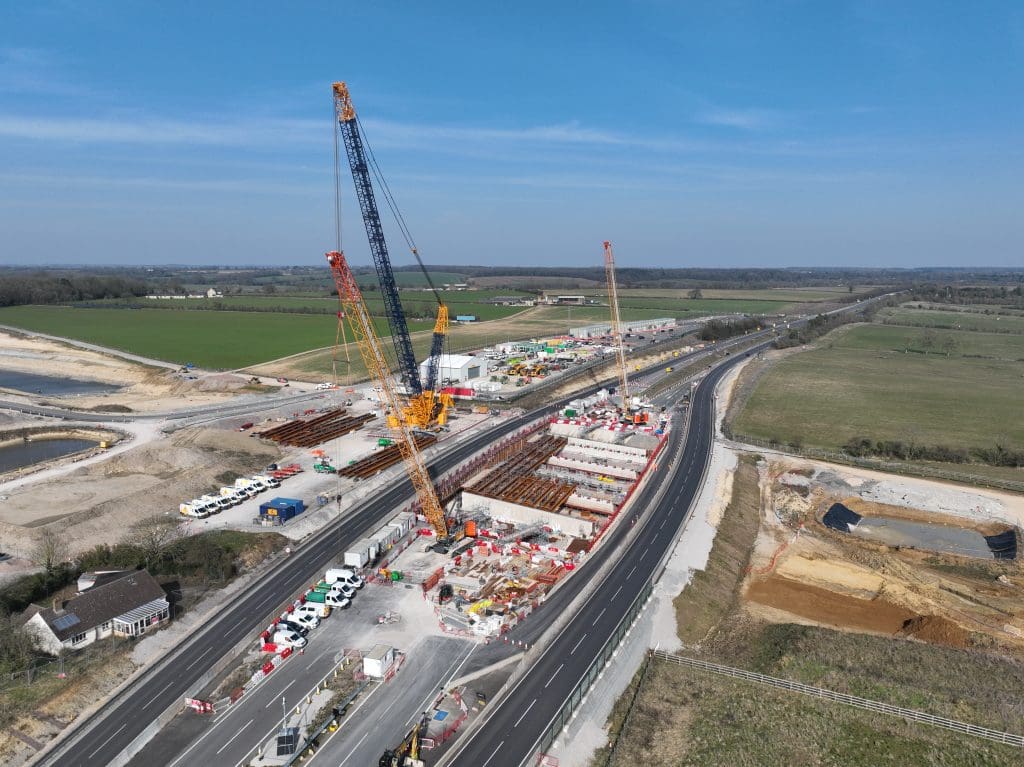 The HS2 Brackley A43 bridge's steel beams being lifted into place